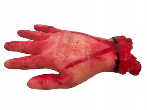 Odcięta dłoń zafoliowana na tacce straszne gadżety do restauracji Halloween